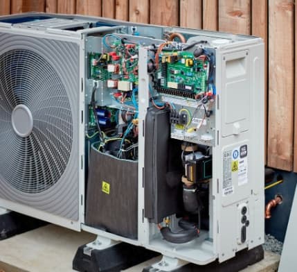 Heat pump engineer at work